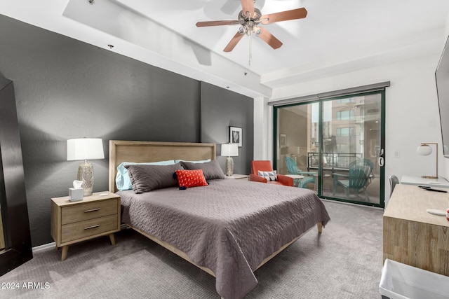 bedroom with access to exterior, ceiling fan, and carpet