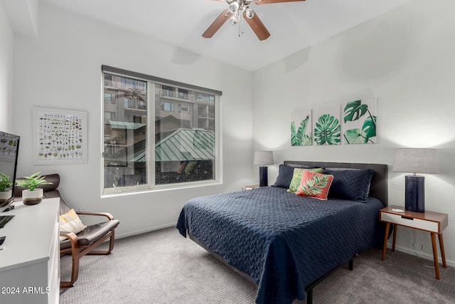 bedroom featuring carpet flooring, multiple windows, and ceiling fan