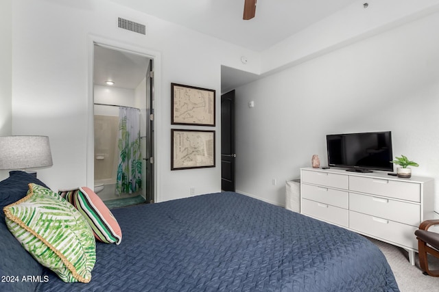 bedroom featuring carpet flooring, connected bathroom, and ceiling fan