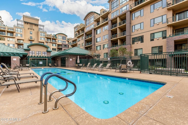 view of pool featuring a patio area