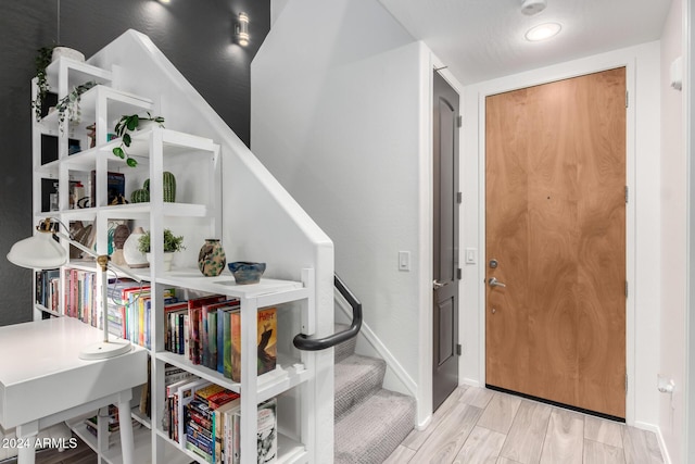 foyer entrance featuring light wood-type flooring