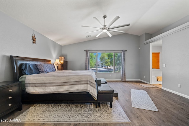 bedroom featuring vaulted ceiling, wood finished floors, baseboards, and a ceiling fan