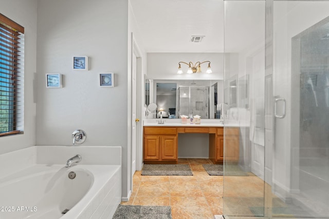 full bath featuring a shower stall, a garden tub, vanity, and tile patterned flooring