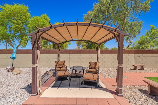 view of patio / terrace with fence