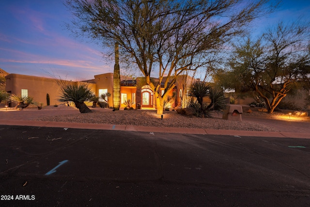 view of adobe home