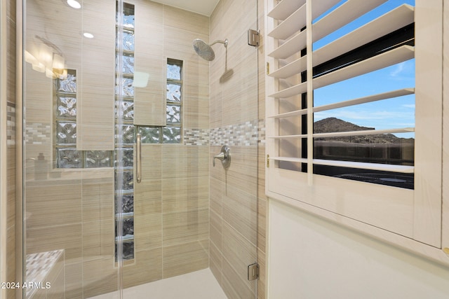 bathroom with an enclosed shower