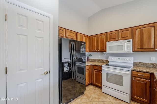 3649 E Hazeltine Way, Chandler, AZ 85249 - kitchen featuring white appliances, light tile patterned floors, brown cabinets, lofted ceiling, and light stone counters