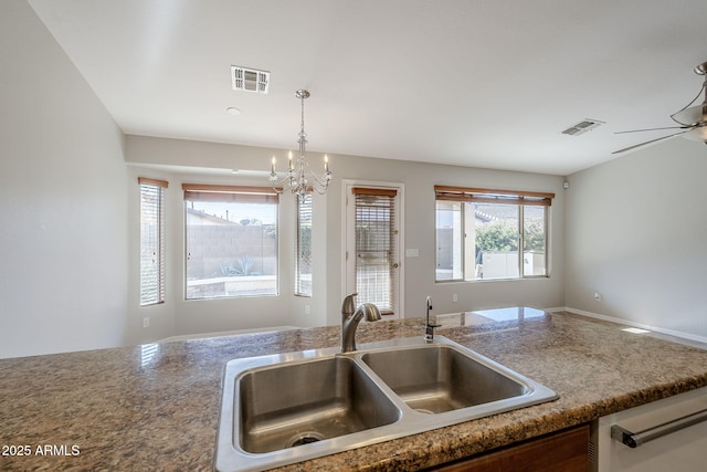 3649 E Hazeltine Way, Chandler, AZ 85249 - kitchen with a sink, a chandelier, dishwashing machine, and open floor plan