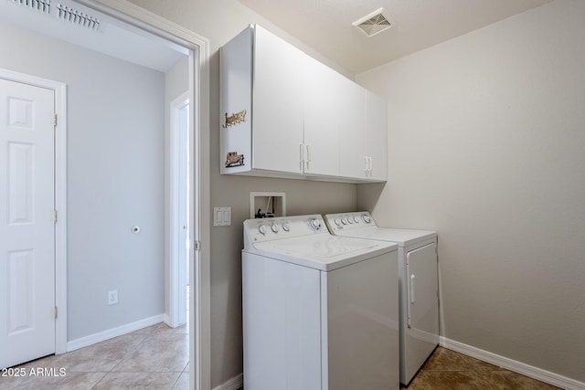 3649 E Hazeltine Way, Chandler, AZ 85249 - laundry area featuring cabinet space, washing machine and clothes dryer, baseboards, and light tile patterned floors