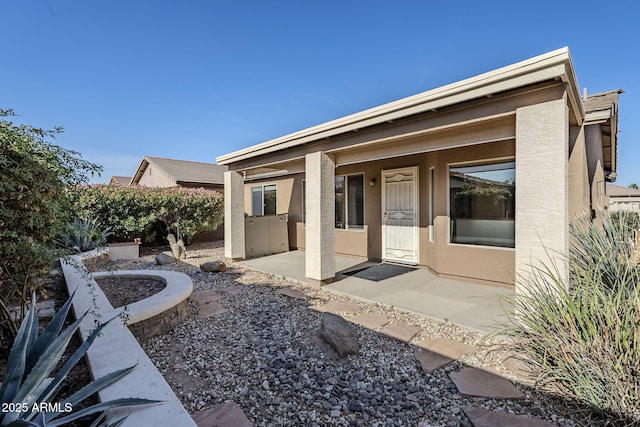 3649 E Hazeltine Way, Chandler, AZ 85249 - rear view of house featuring stucco siding