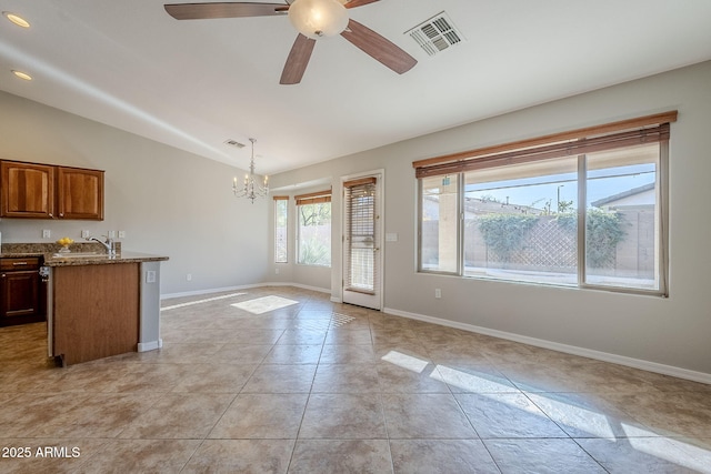 3649 E Hazeltine Way, Chandler, AZ 85249 - kitchen with a chandelier, a sink, a ceiling fan, light tile patterned floors, and dark stone counters
