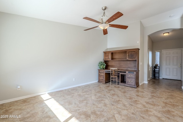 3649 E Hazeltine Way, Chandler, AZ 85249 - unfurnished office featuring arched walkways, ceiling fan, baseboards, vaulted ceiling, and light tile patterned floors