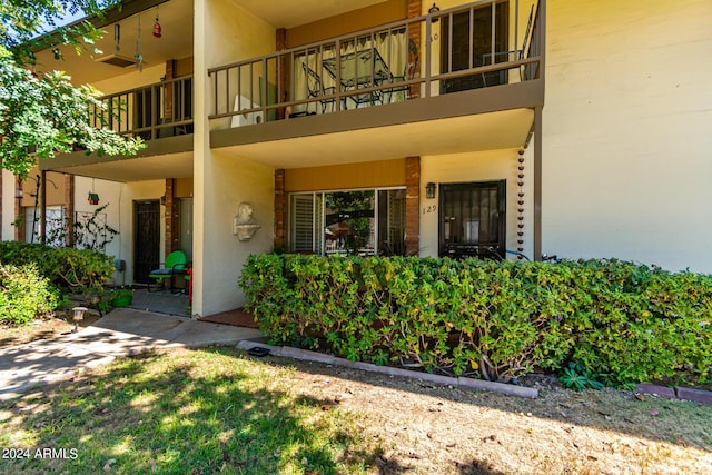 exterior space featuring a balcony