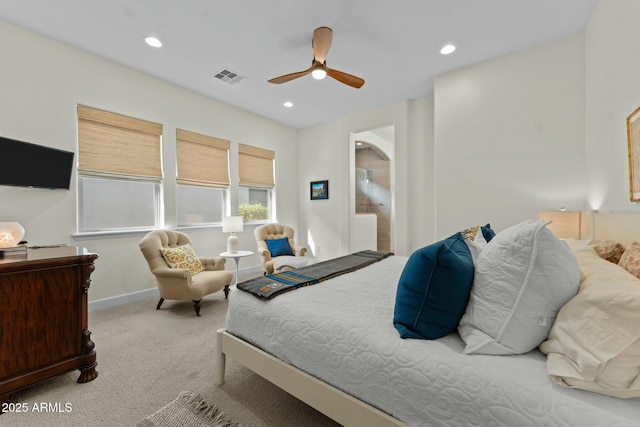 bedroom with light colored carpet and ceiling fan