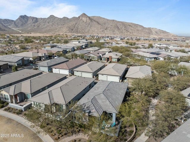 bird's eye view with a mountain view