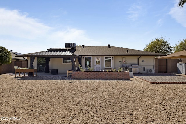 back of house featuring a patio and central AC unit