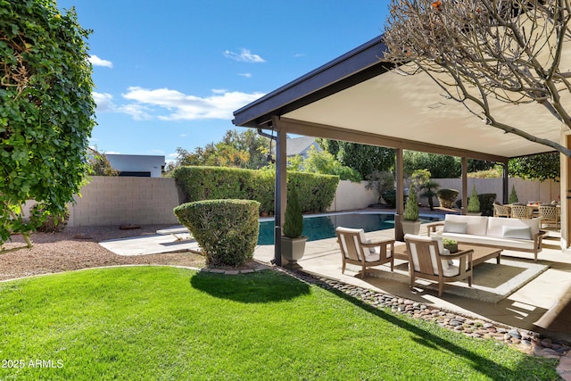 view of yard featuring a fenced in pool, a patio area, and outdoor lounge area