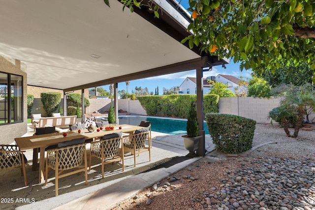 view of patio / terrace featuring a fenced in pool