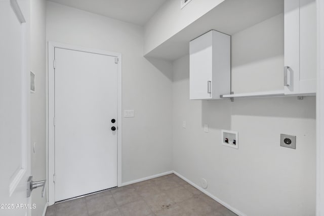 washroom with washer hookup, hookup for an electric dryer, and cabinets