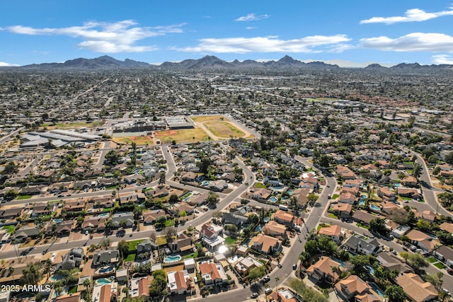 drone / aerial view featuring a mountain view