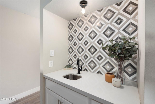 bathroom featuring vanity and hardwood / wood-style flooring