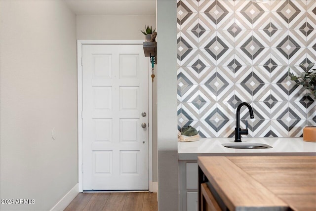 kitchen featuring sink and light hardwood / wood-style flooring