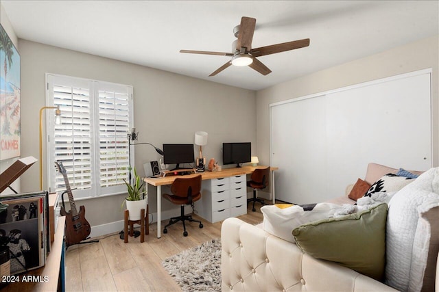 office space featuring light hardwood / wood-style floors and ceiling fan