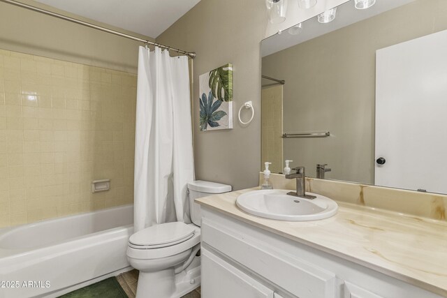 full bathroom featuring toilet, shower / bath combination with curtain, and vanity