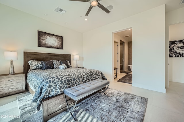 bedroom featuring ensuite bath and ceiling fan