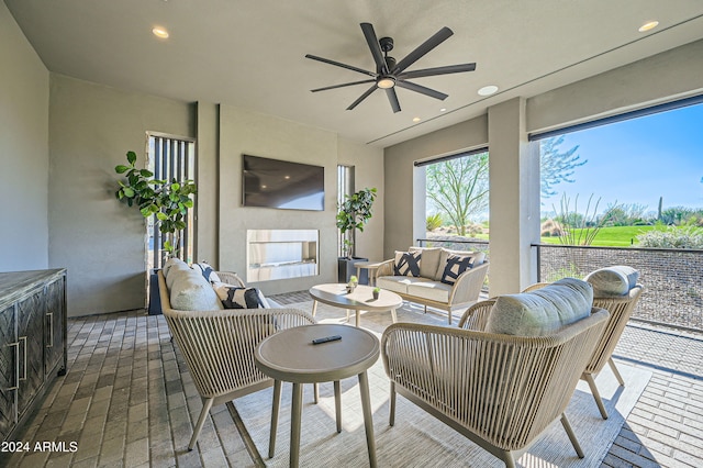 interior space featuring ceiling fan