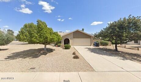 15637 N 54th St, Scottsdale, AZ 85254 - view of front of property featuring concrete driveway and an attached garage