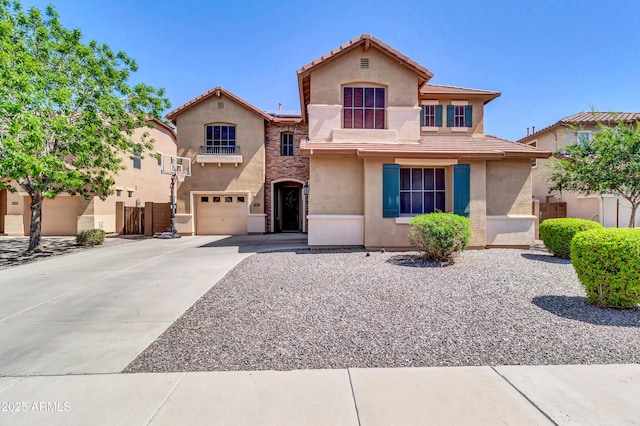 742 E Kingbird Dr, Gilbert, AZ 85297 - mediterranean / spanish home featuring stucco siding, an attached garage, roof mounted solar panels, and concrete driveway