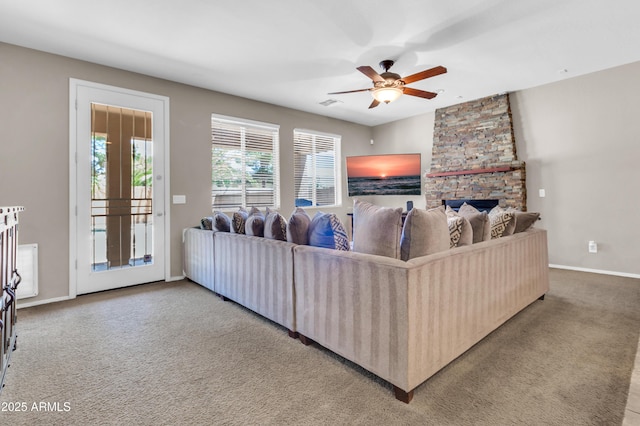 742 E Kingbird Dr, Gilbert, AZ 85297 - carpeted living area featuring a ceiling fan and a fireplace