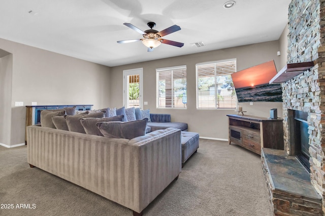 742 E Kingbird Dr, Gilbert, AZ 85297 - carpeted living area with ceiling fan and a fireplace
