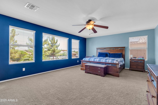 742 E Kingbird Dr, Gilbert, AZ 85297 - carpeted bedroom with multiple windows and ceiling fan