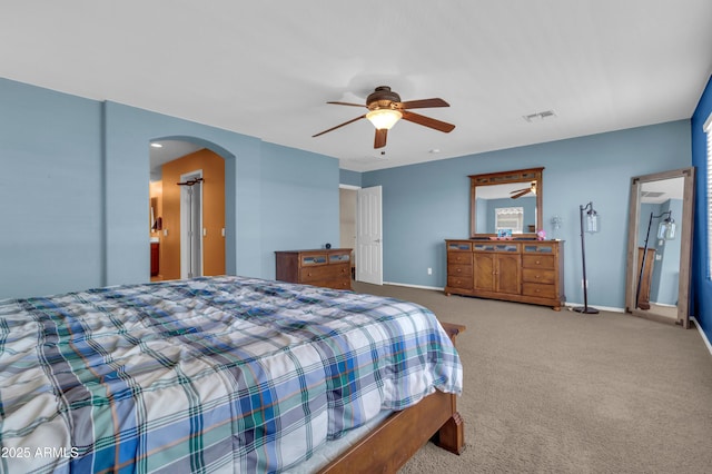 742 E Kingbird Dr, Gilbert, AZ 85297 - bedroom with arched walkways, carpet flooring, and ceiling fan