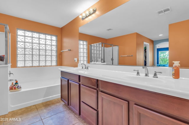 742 E Kingbird Dr, Gilbert, AZ 85297 - full bath with a bath, tile patterned flooring, double vanity, and an enclosed shower