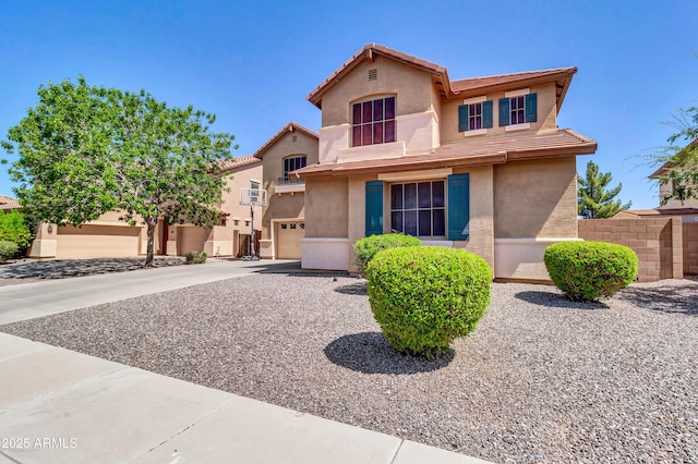 742 E Kingbird Dr, Gilbert, AZ 85297 - view of front of house with stucco siding, a tiled roof, and driveway