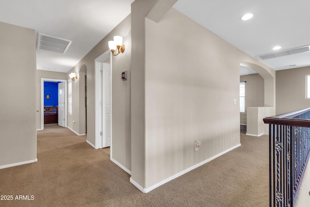 742 E Kingbird Dr, Gilbert, AZ 85297 - hallway with arched walkways, carpet flooring, and recessed lighting