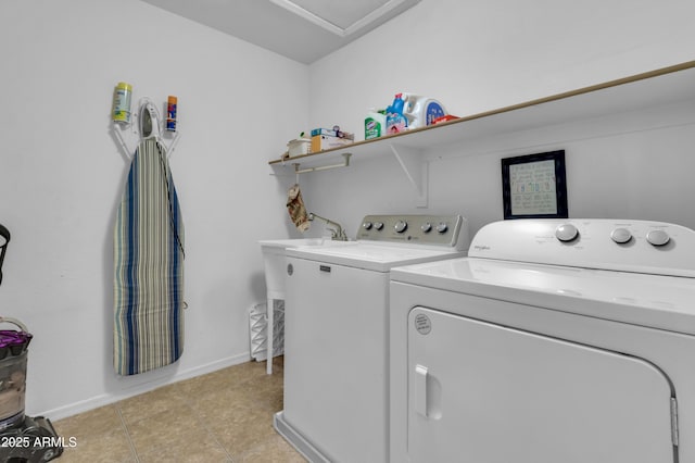 742 E Kingbird Dr, Gilbert, AZ 85297 - laundry room featuring washer and clothes dryer and light tile patterned floors