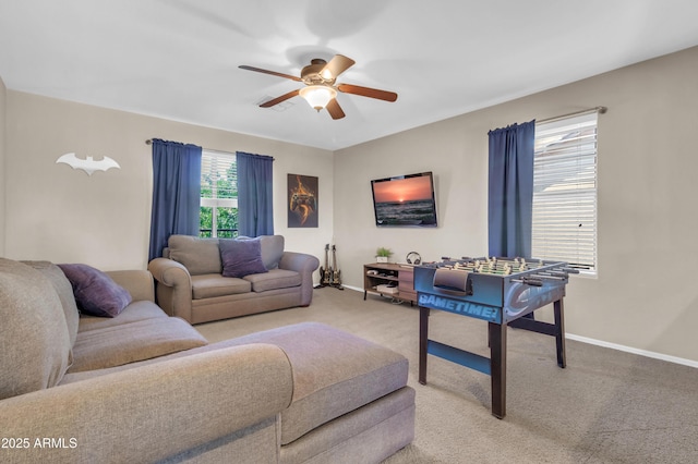 742 E Kingbird Dr, Gilbert, AZ 85297 - living room featuring a ceiling fan and light colored carpet