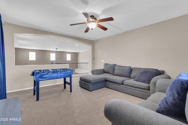 742 E Kingbird Dr, Gilbert, AZ 85297 - living area with ceiling fan, carpet flooring, and arched walkways