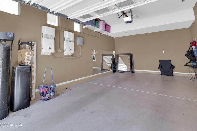 742 E Kingbird Dr, Gilbert, AZ 85297 - garage with a garage door opener and baseboards