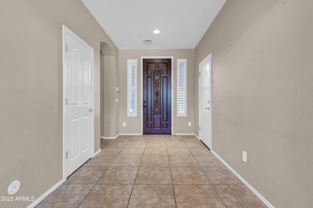 742 E Kingbird Dr, Gilbert, AZ 85297 - entrance foyer featuring tile patterned floors and arched walkways