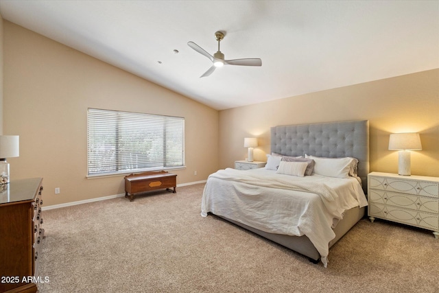 bedroom with carpet floors, a ceiling fan, baseboards, and lofted ceiling
