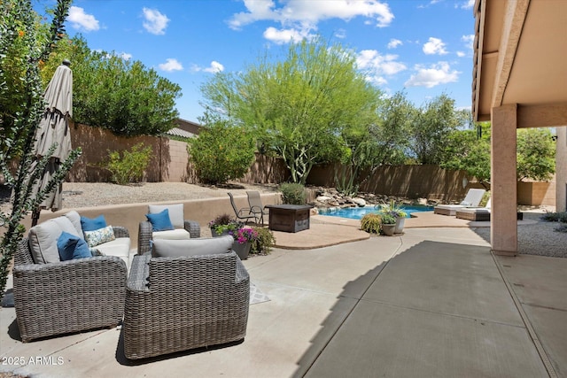 view of patio featuring a fenced in pool, a fenced backyard, and outdoor lounge area