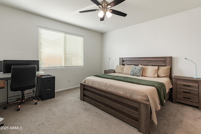 bedroom with baseboards, carpet floors, and ceiling fan