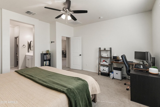 carpeted bedroom with a ceiling fan, visible vents, and baseboards