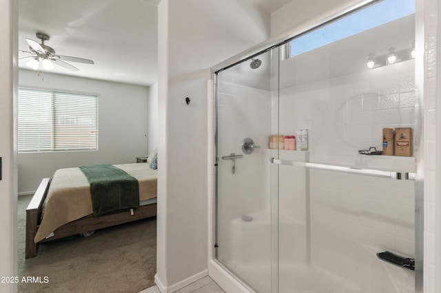 bathroom featuring a stall shower, a wealth of natural light, and connected bathroom