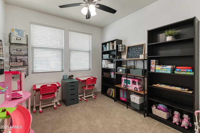 playroom with baseboards, carpet floors, and a ceiling fan